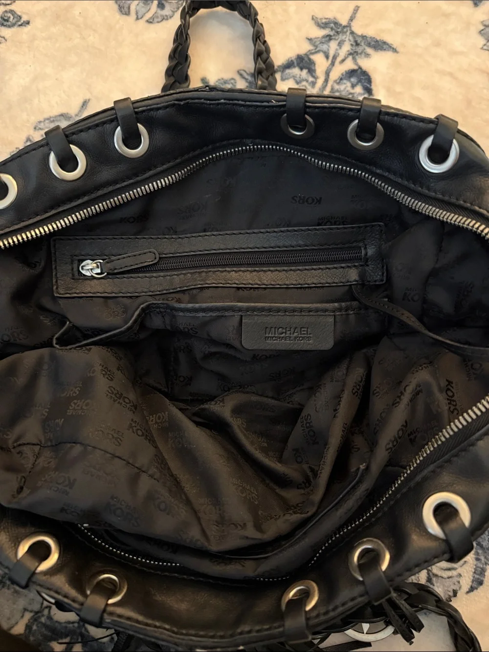 Michael Kors Black Leather Shoulder Bag with Braided Handles and Tassel